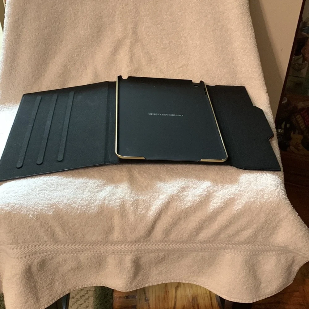 Black Christian Siriano iPad case.